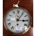 A Davey and Co brass porthole clock, the white dial with black Roman numerals and a subsidiary dial,