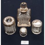 A set of five silver topped dressing table bottles
