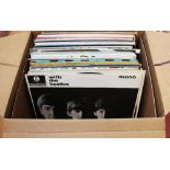 A box of LP 33 rpm and single 45 rpm records,