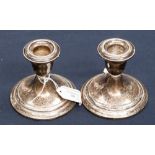 A pair of Goram sterling silver weighted squat candlesticks (2)