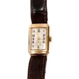 A 1940s 9 ct gold cased Gent's Wristwatch with rectangular dial,