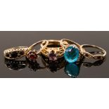 A 9ct gold cluster ring set with garnets,