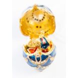 A 'Majestic Collection' silver gilt and guilloche blue enamelled miniature Egg Pendant,