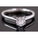 A solitaire diamond Ring, claw set round brilliant of approx. 0.