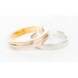 A 22ct two-colour gold Wedding Band in yellow gold with central white gold raised band,