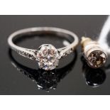 A single stone ring set with an old cut diamond weighing approximately 0.