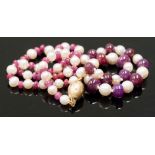 A graduated ruby bead and cultured pearl Necklace, approx. 42.