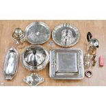 A quantity of silver plated ware to include a cocktail shaker, salvers, muffin dish, waiters,