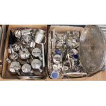 A box of silver plated items including trays, toast rack, flatware and a box of stainless steel,