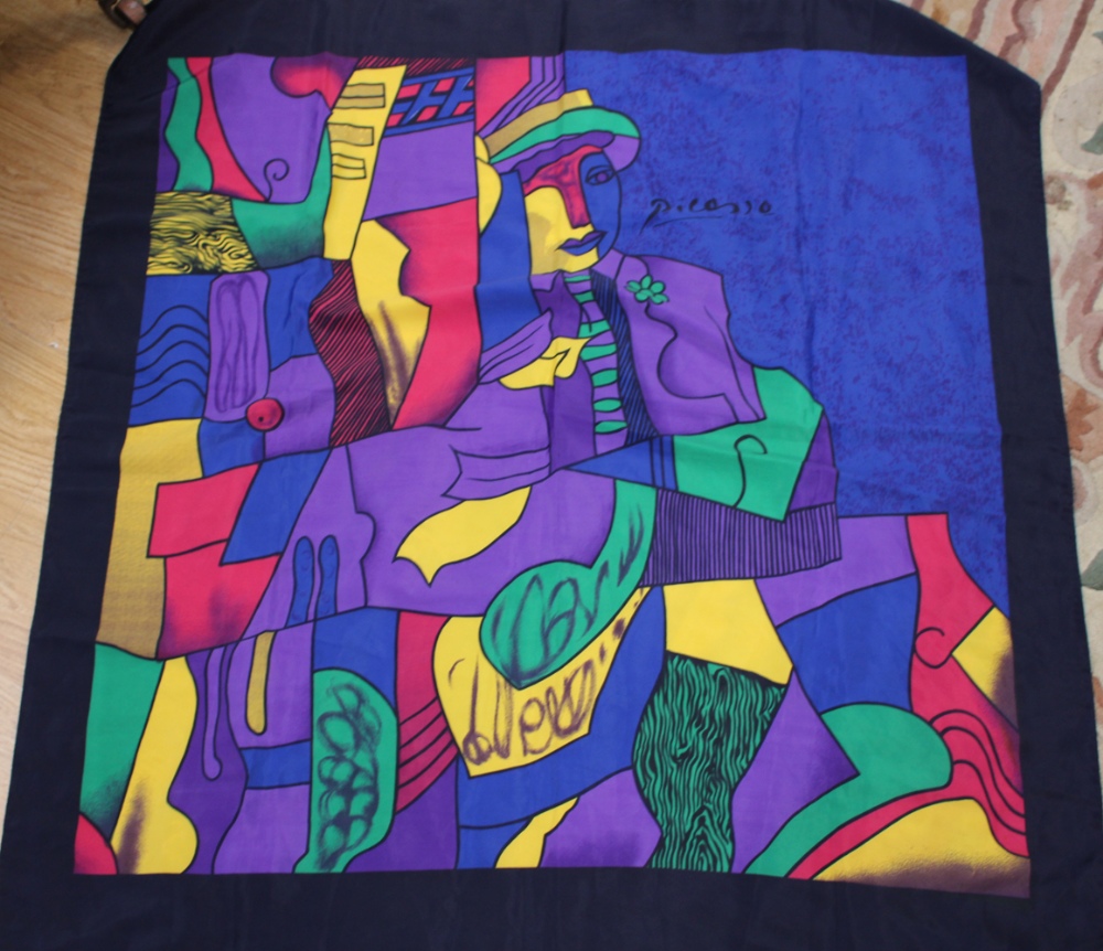 A silk scarf designed and signed by Picasso, made in Paris, France.