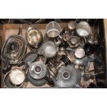 A box of silver plate and pewter including tea wares, small trophy cups,
