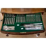 A James Dixon canteen of cutlery in two draws in presentation table with three pairs of silver