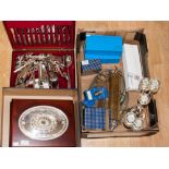 A box of metalware including a canteen of Oneida stainless steel cutlery,