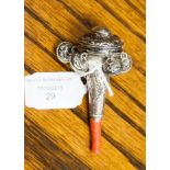 ***REOFFER JANUARY £80/100*** A Georgian silver baby's rattle with six pendent bells and coral