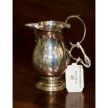 An early Twentieth Century sterling silver sparrow beak cream pitcher, in the George II style,