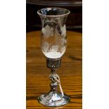 A silver stem single candelabrum with glass shade,