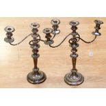 A pair of early 19th century old Sheffield plate candelabra,