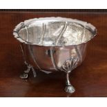 A George III Irish sterling silver circular bowl with period fluted decoration and wavy rim edge,