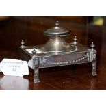 A George V sterling silver inkwell in the neoclassical Adam's style, with chased husk swags,