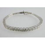 An 18ct white gold and diamond articulat