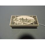 A scrimshaw-style rectangular bone box,