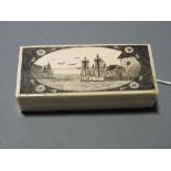 A scrimshaw-style rectangular bone box,