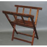 A 20th century mahogany folding X-frame