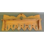 A rustic design pine hanging coat rack,