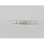 An 18ct white gold diamond full eternity