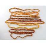 Eight assorted simulated amber bead neck