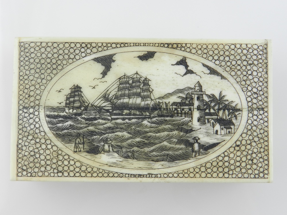 An 18th century style carved bone box, the hinged lid decorated with sailing ships and a lighthouse.