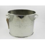 A silver plated twin handled champagne cooler.