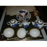 A Russian gilt and blue tea set, include