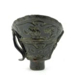 A Chinese carved horn libation cup, bear