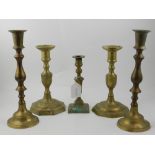 A pair of brass candlesticks, having kno