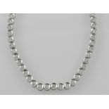 A ladies diamond mounted 18ct white gold necklace, featuring 74 collet set diamonds of approximately