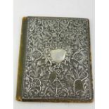 A 19th century silver book cover, having