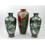 A pair of Japanese green cloisonne vases