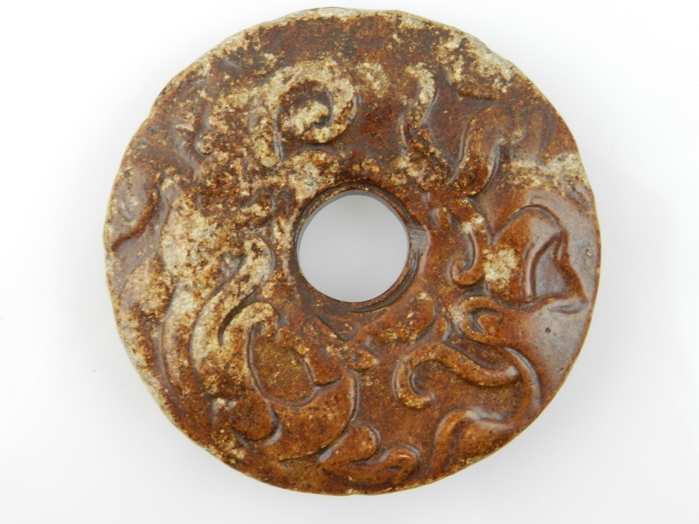 A Chinese circular carved stone