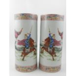 A pair of Chinese famille verte cylindri