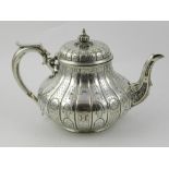 A silver plated Elkington tea pot, engra