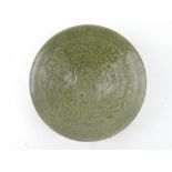 A Chinese olive coloured bowl, with crac