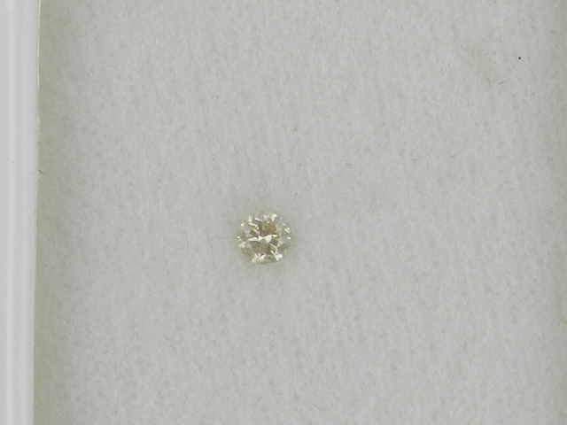 A loose diamond, of approx. 0.09 carats.