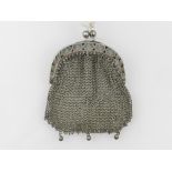 A small silvered mesh bag