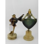 A pair of Art Deco style figurines, one