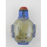 A Chinese reverse glass painted snuff bo