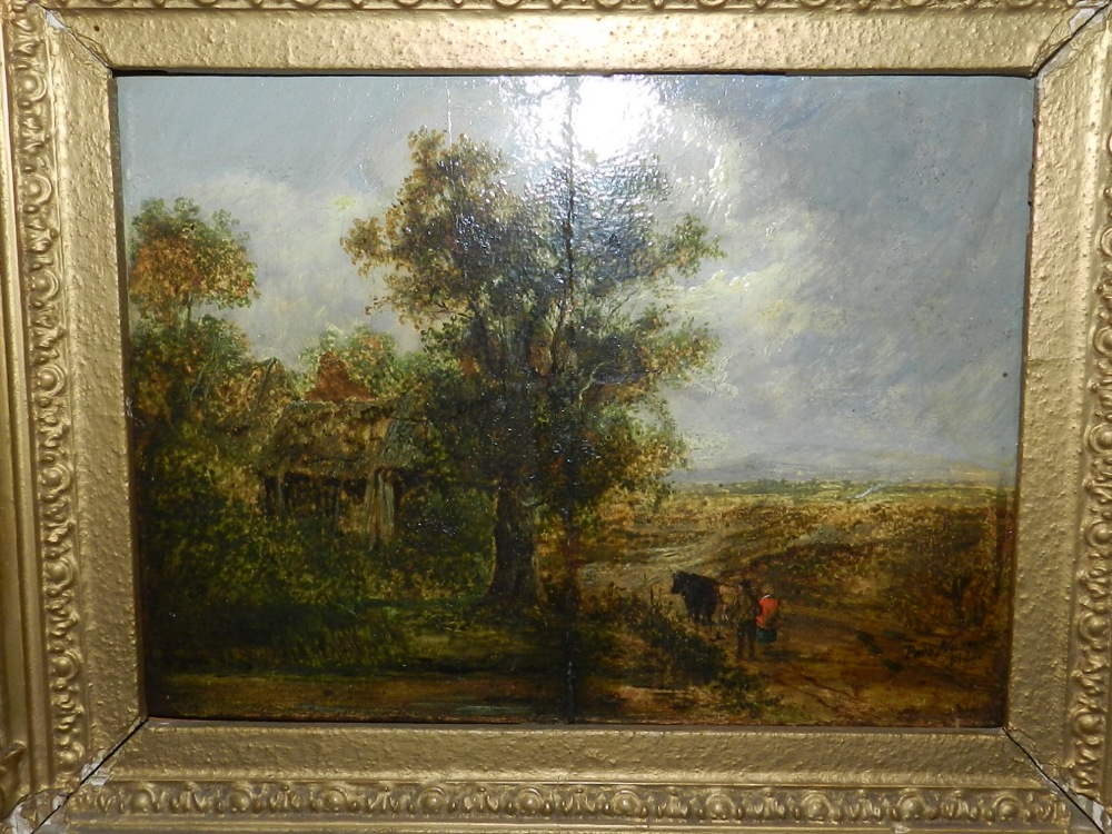 An early 19th century Continental School, a pastoral wooded landscape with cattle drover in