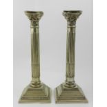 A pair of beaded compositional white met