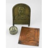 A pressed copper plaque of Edward Rigg J