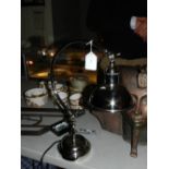 A silver plated table lamp